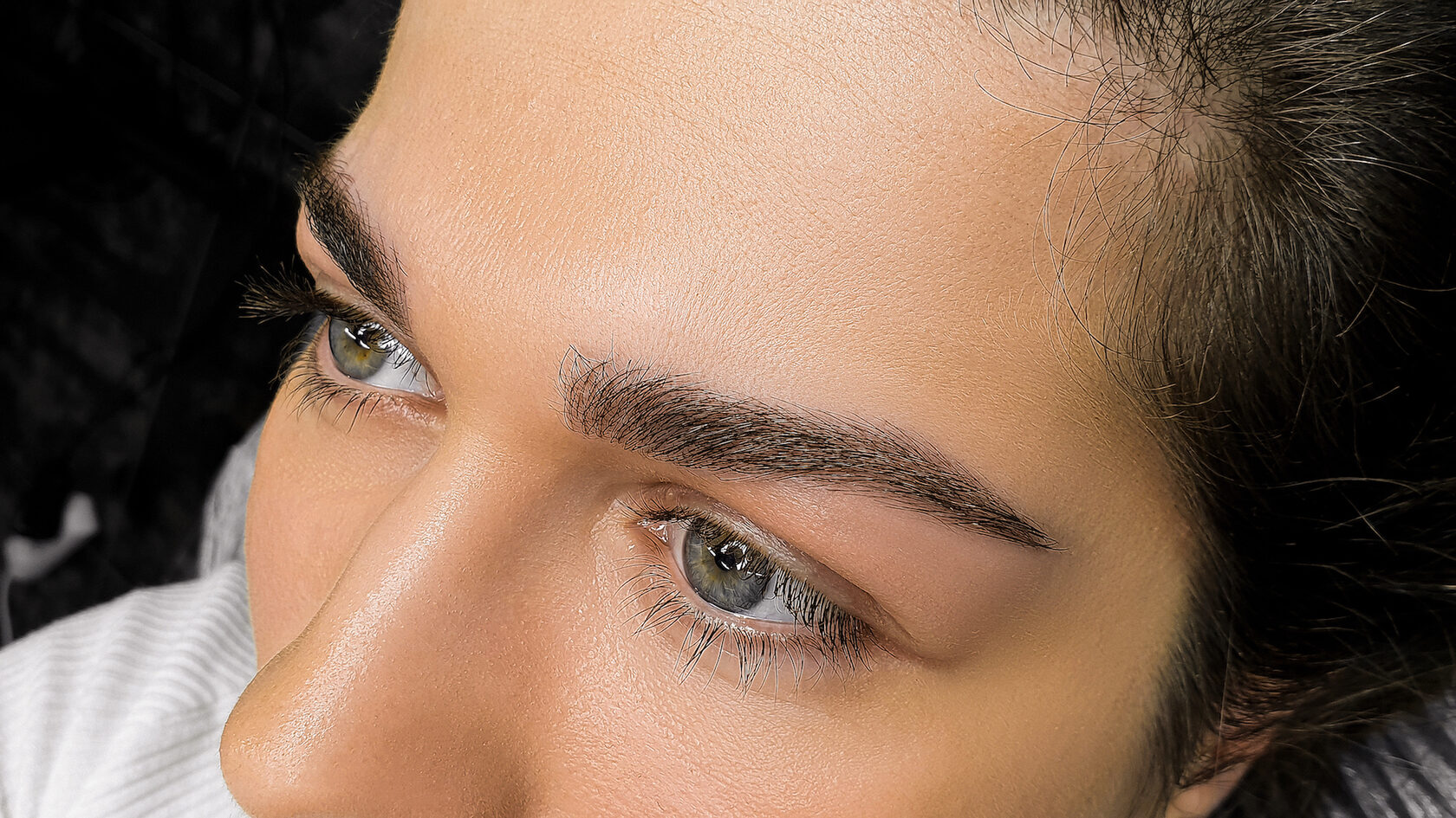 Close-up portrait showing microbladed brows